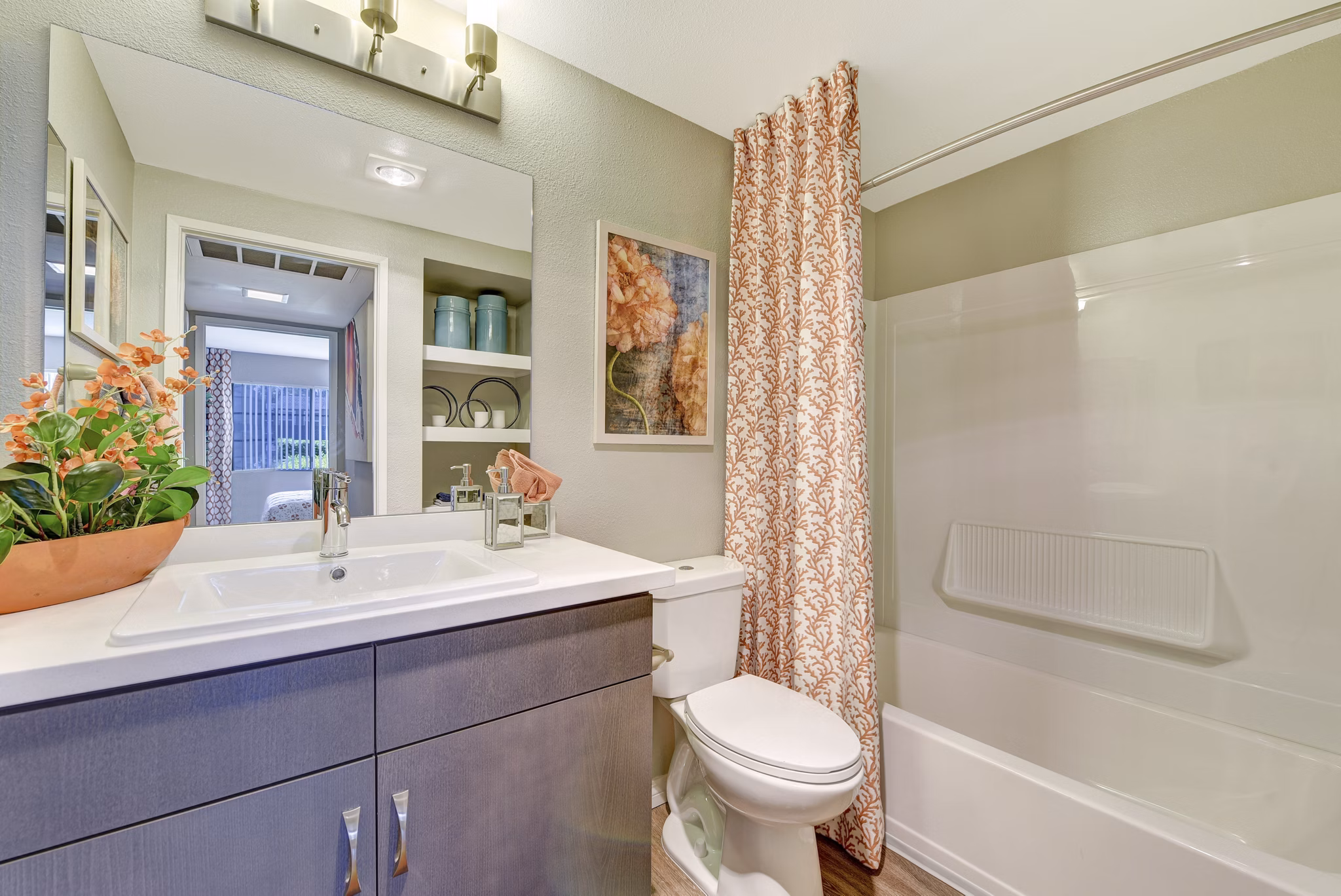 Modern bathroom with sleek fixtures and granite countertops in Park Pointe Apartments