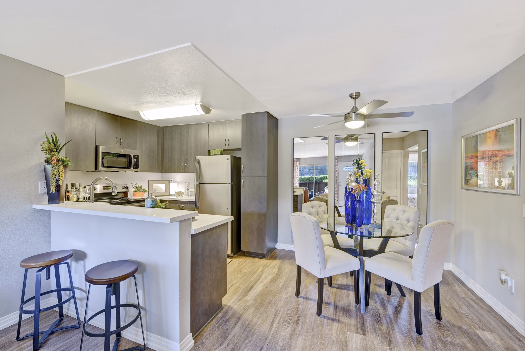 Dining area featuring modern furnishings and large windows in Park Pointe Apartments