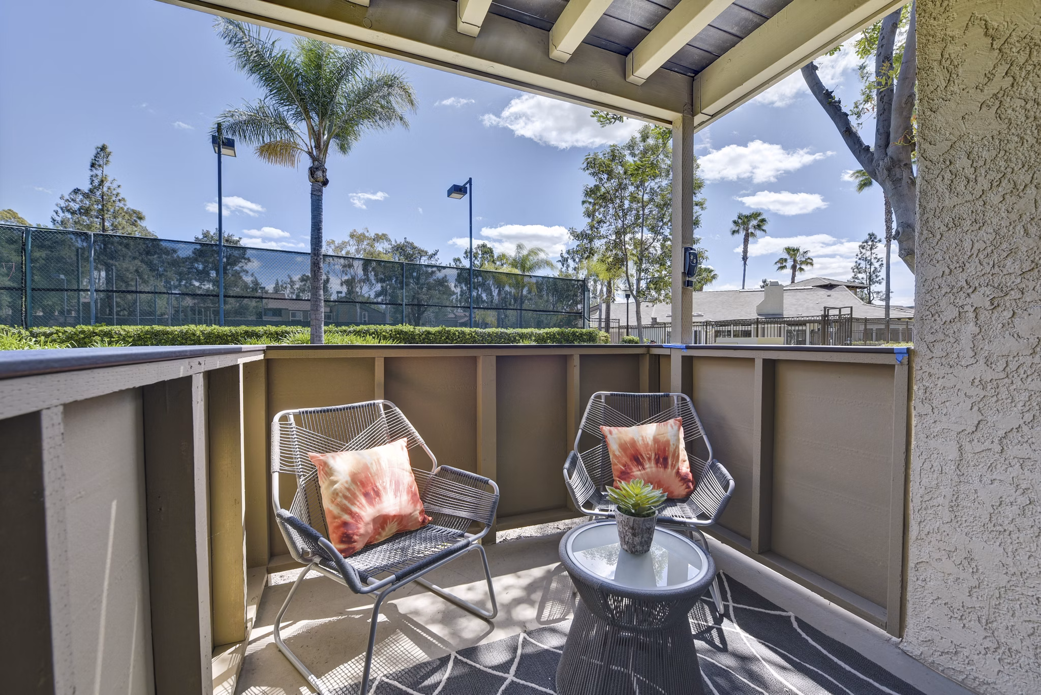 Park Pointe Apartments: Modern patio with outdoor seating in a luxury community, offering a relaxing retreat in a vibrant neighborhood