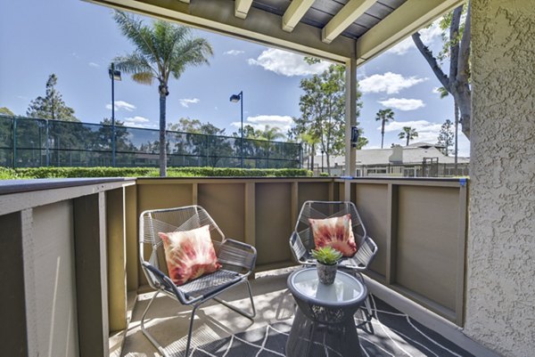 Park Pointe Apartments: Modern patio with outdoor seating in a luxury community, offering a relaxing retreat in a vibrant neighborhood