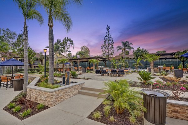 Serene courtyard with landscaped gardens at Park Pointe Apartments offering tranquility and relaxation in urban living