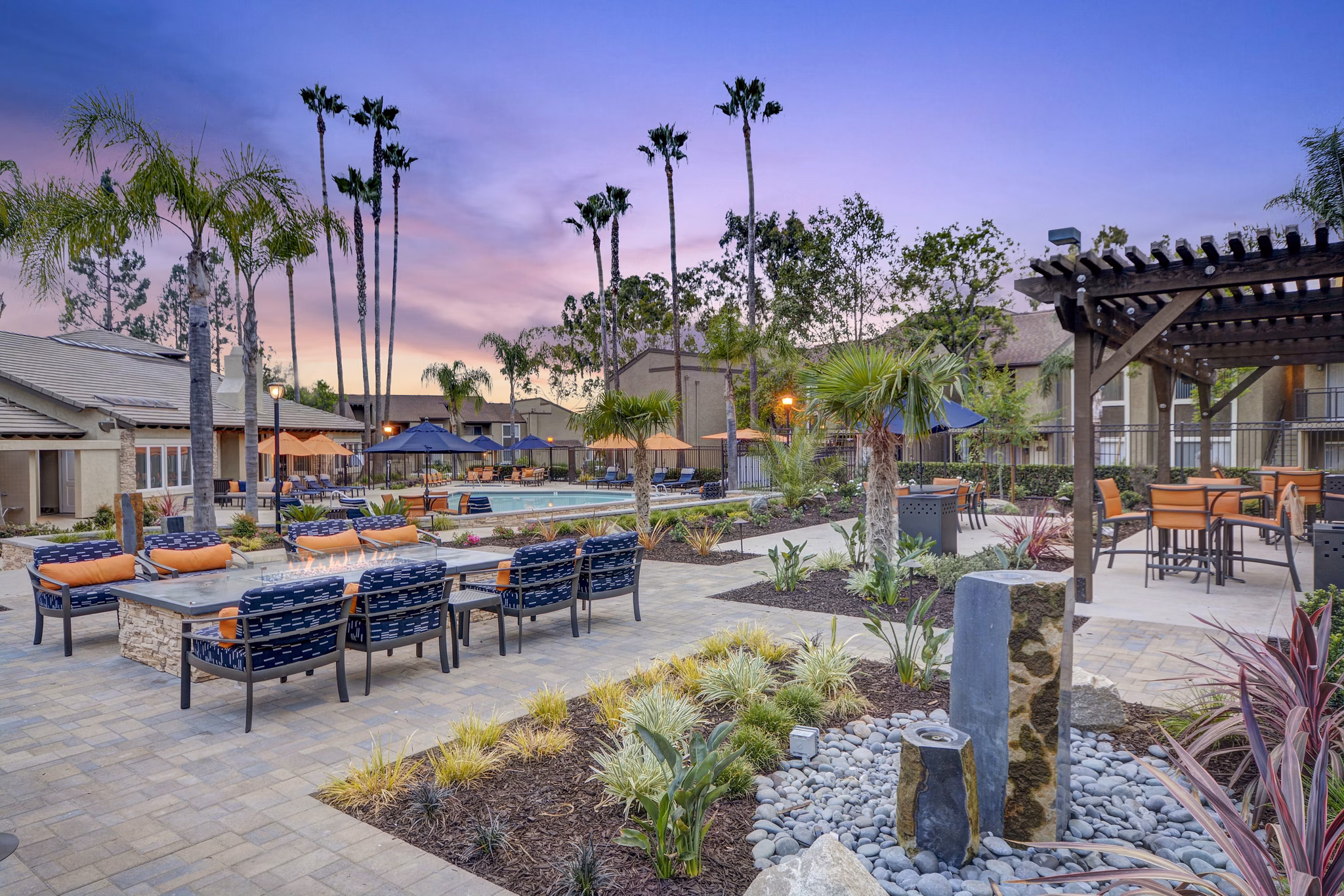 Courtyard with landscaped gardens at Park Pointe Apartments luxury in a serene environment with seating areas