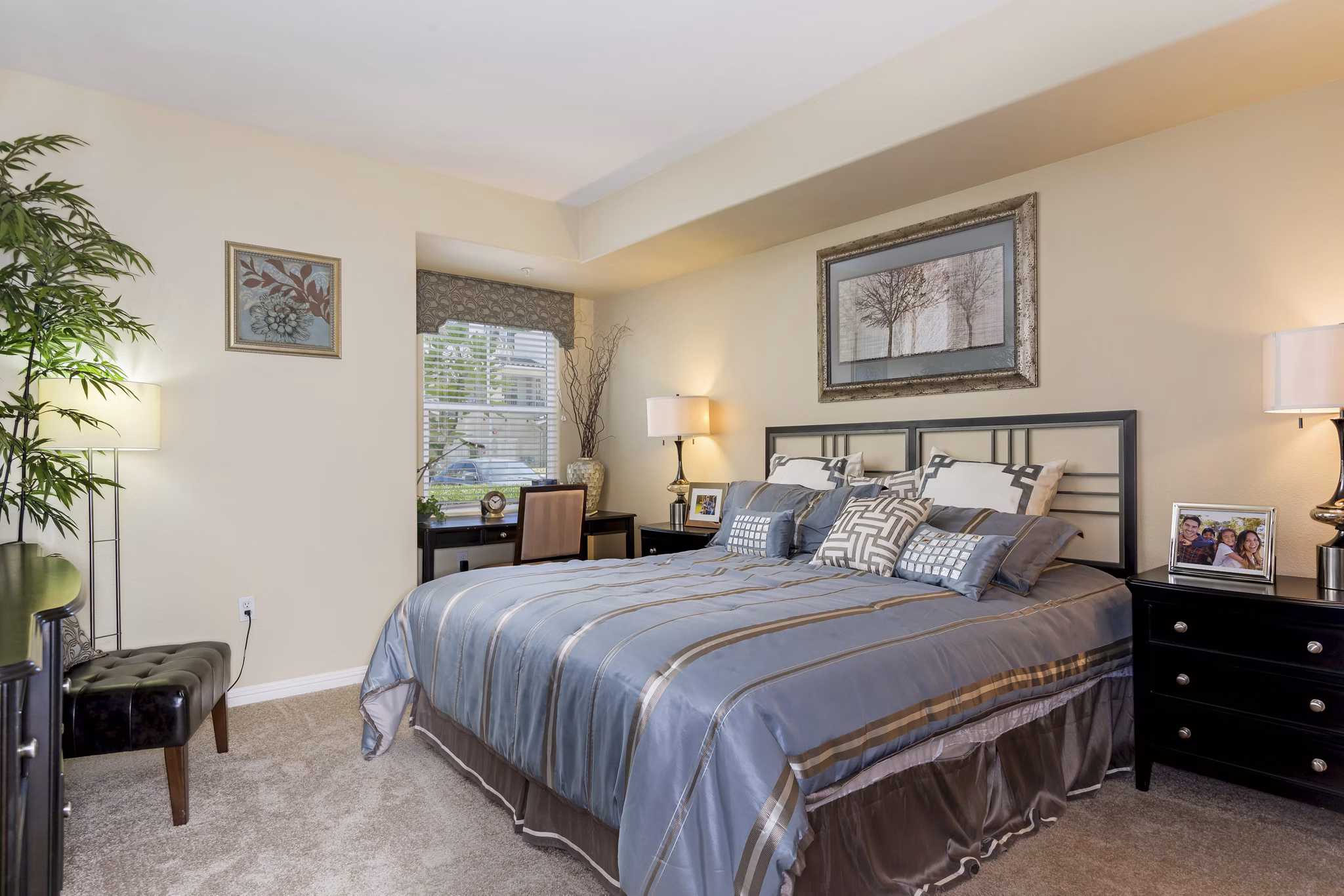 Cozy bedroom with modern decor at Rosina Vista Apartments