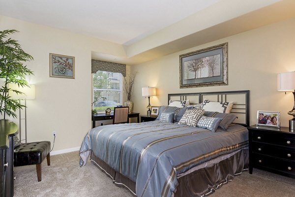 Cozy bedroom with modern decor at Rosina Vista Apartments