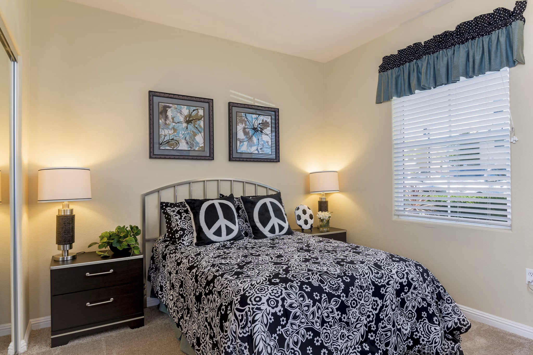 Cozy bedroom with natural light and modern decor at Rosina Vista Apartments, a luxury community by Greystar in Chula Vista