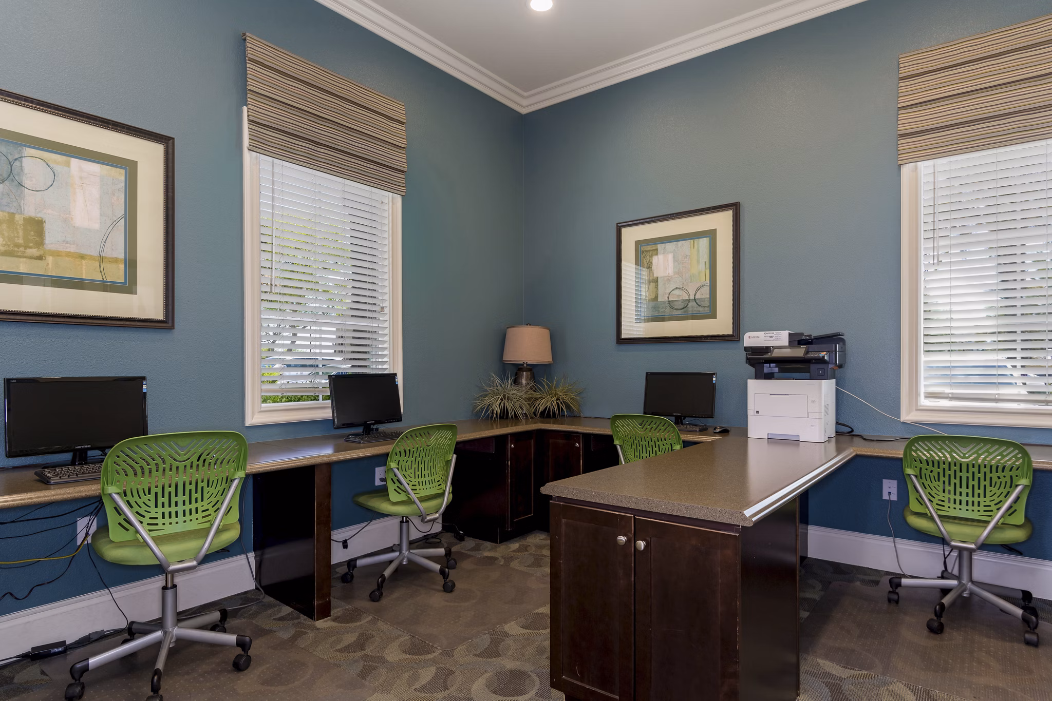 Modern business center with sleek workstations at Rosina Vista Apartments designed for productivity and comfort