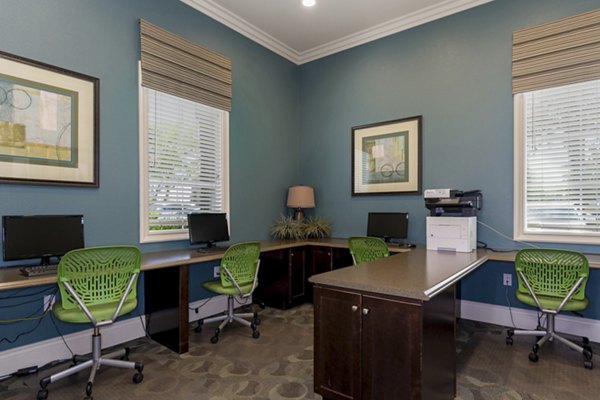 Modern business center with sleek workstations at Rosina Vista Apartments designed for productivity and comfort