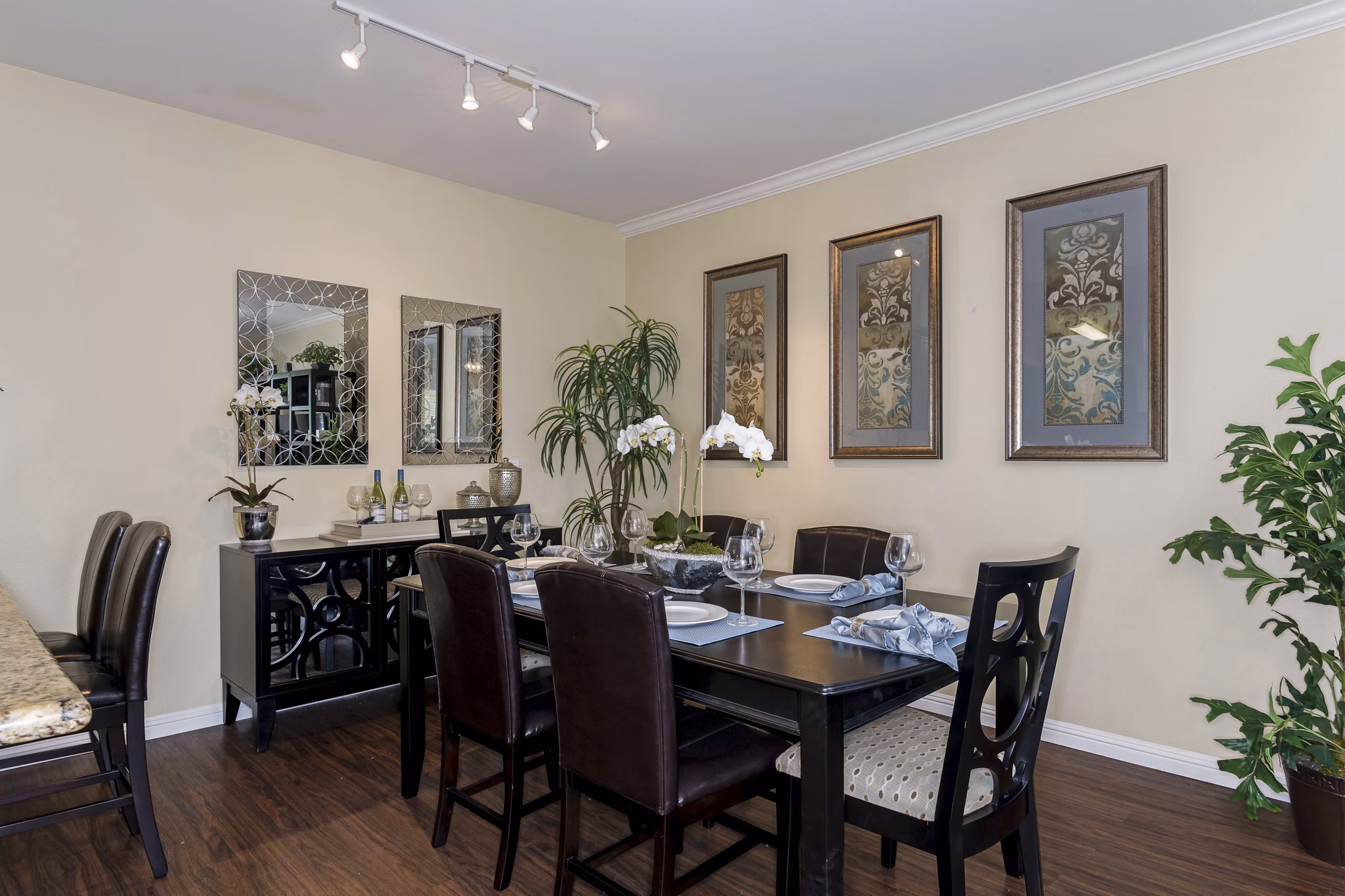 Dining room with elegant decor and modern furniture at Rosina Vista Apartments