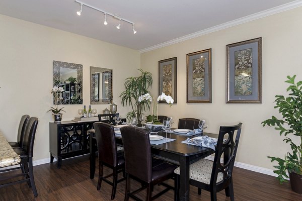 Dining room with elegant decor and modern furniture at Rosina Vista Apartments