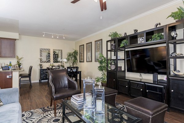 Elegant living room with modern furnishings at Rosina Vista Apartments, a Greystar luxury community