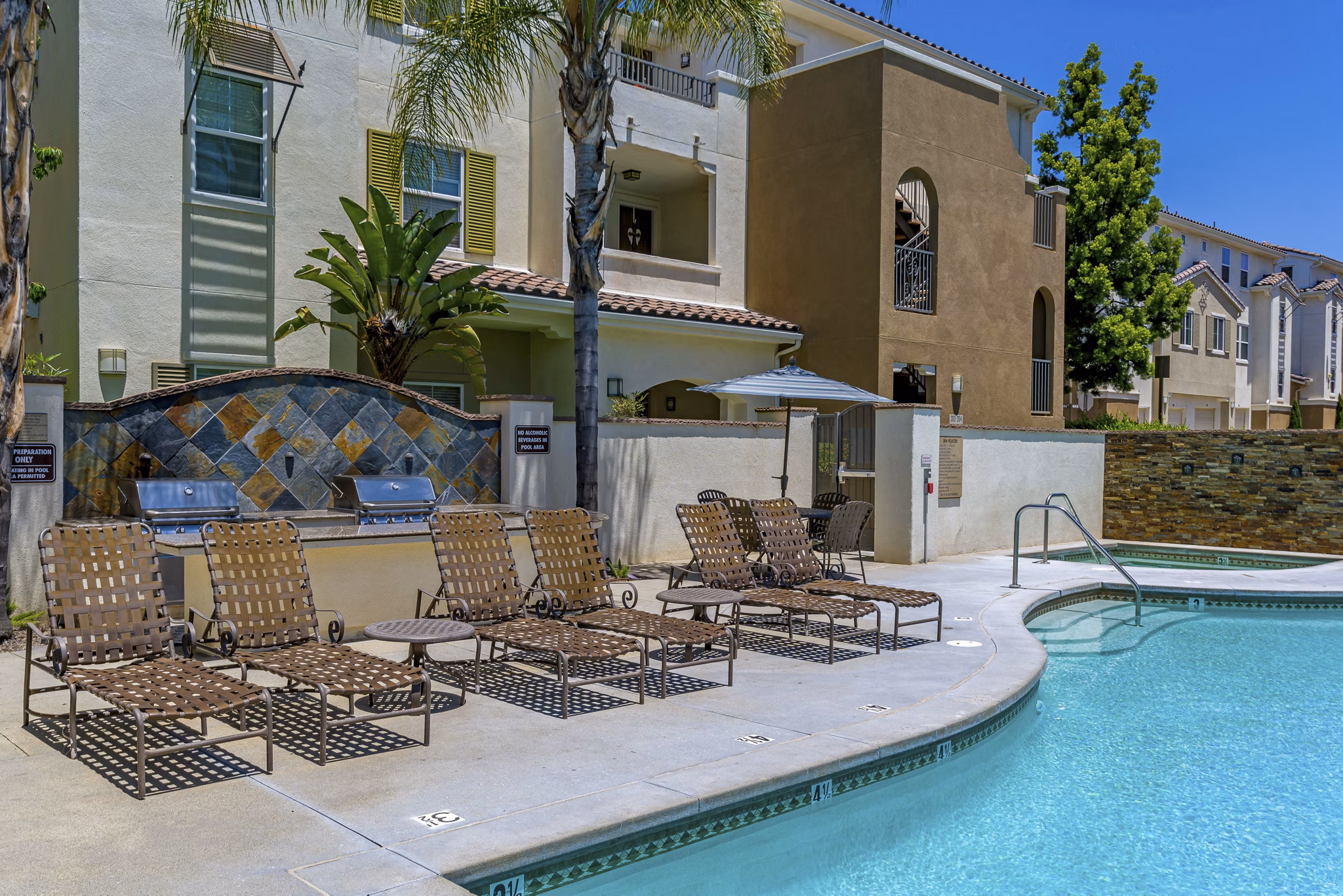 Resort-style pool at Rosina Vista Apartments - luxurious outdoor amenity perfect for relaxation and recreation