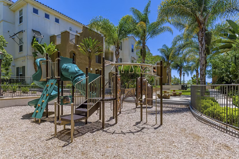 Colorful playground at Rosina Vista Apartments offering fun outdoor activities for children in a safe and vibrant community setting