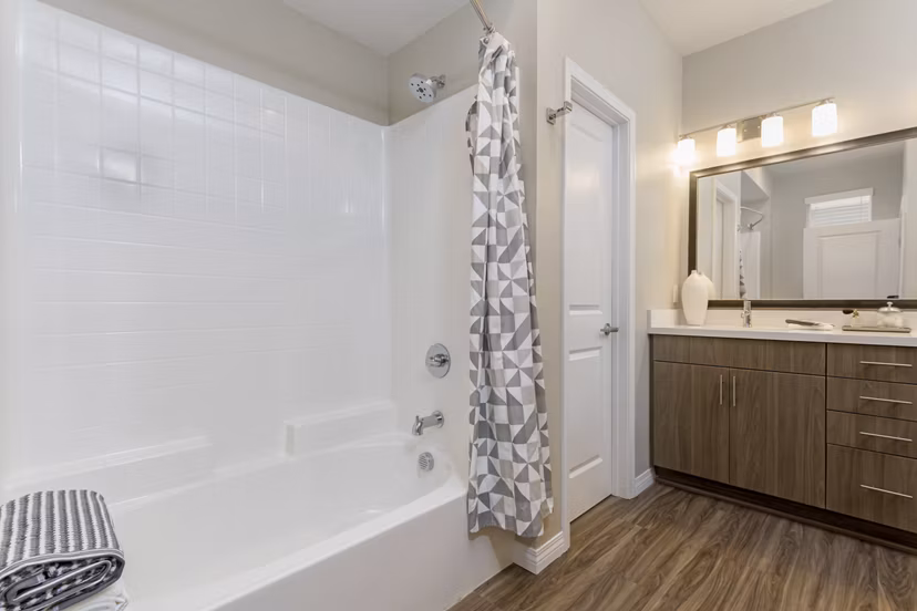 Modern bathroom with sleek fixtures at Salerno Apartments in luxury Greystar community