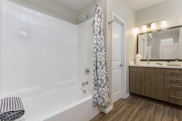 Modern bathroom with sleek fixtures at Salerno Apartments in luxury Greystar community