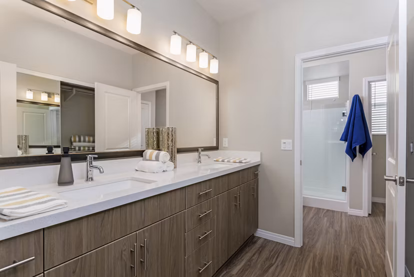 Modern bathroom with sleek fixtures at Salerno Apartments, offering luxury living in a premier location