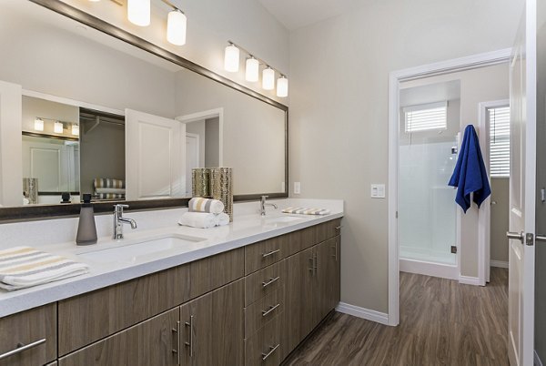 Modern bathroom with sleek fixtures at Salerno Apartments, offering luxury living in a premier location
