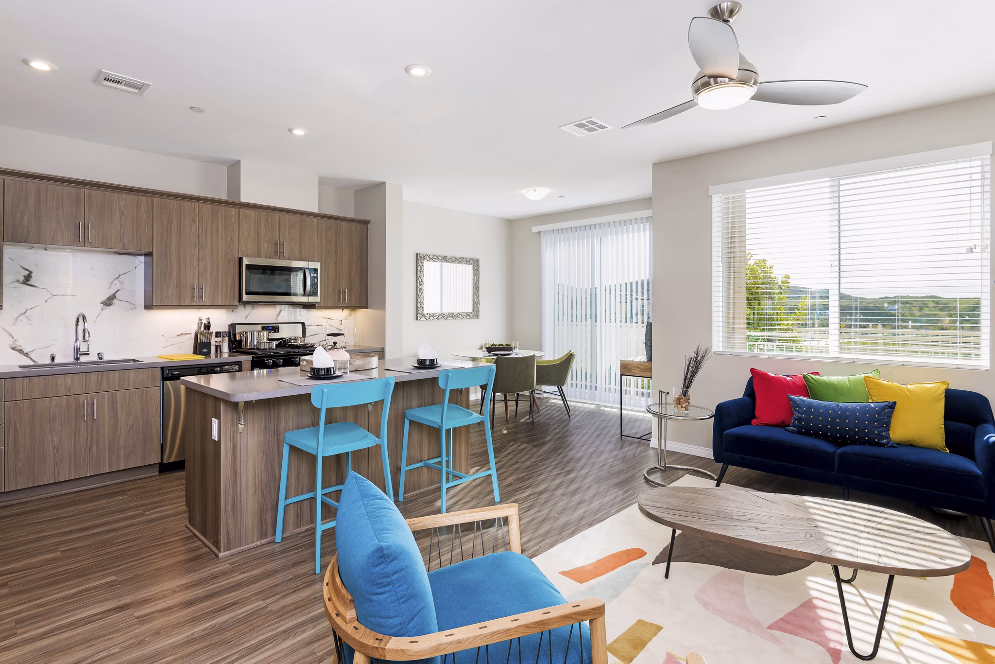 Spacious living room with modern decor and natural light in Salerno Apartments Perfect for relaxation and entertaining in a luxury setting