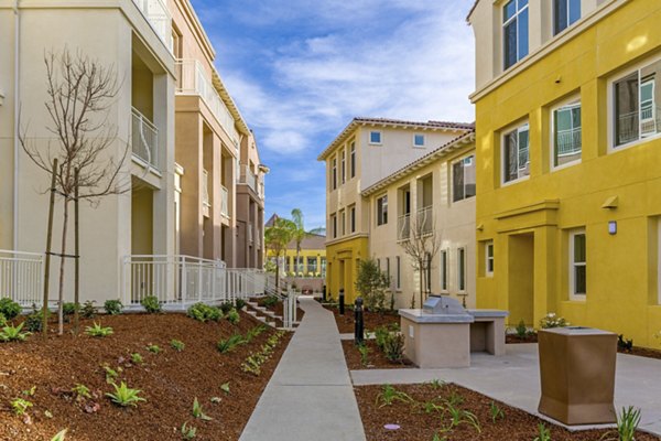 Modern outdoor grill area at Salerno Apartments ideal for social gatherings