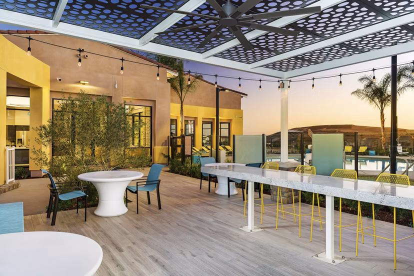 Patio and grill area for outdoor gatherings at Salerno Apartments