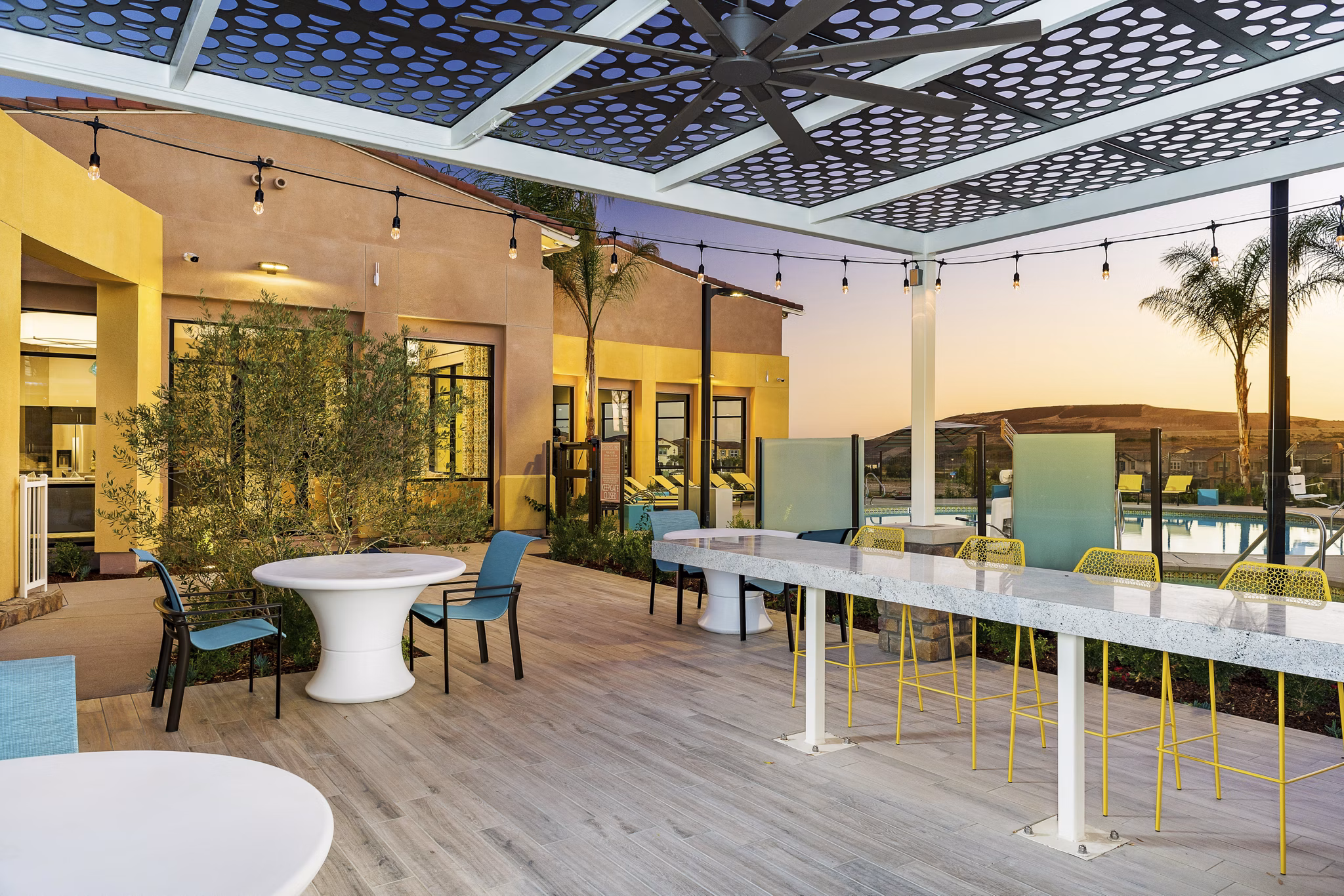 Patio and grill area for outdoor gatherings at Salerno Apartments