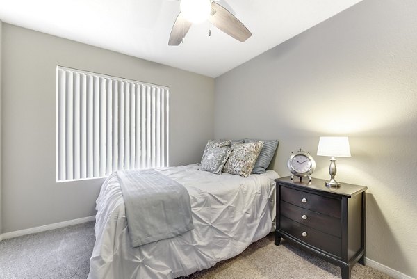 Elegant bedroom with modern decor at Santee Villas Apartments featuring luxurious amenities