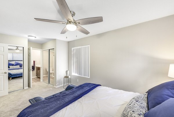 Cozy bedroom with modern decor at Santee Villas Apartments