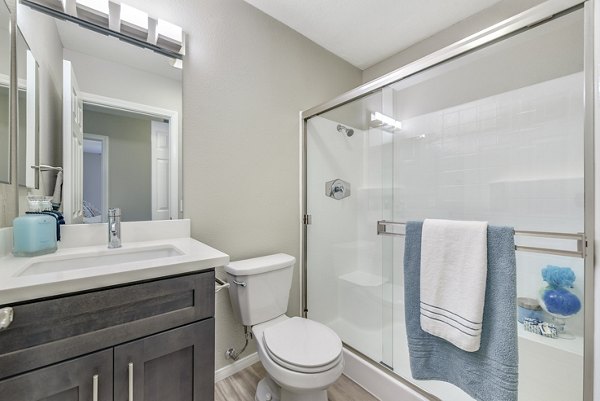 Modern bathroom with sleek fixtures at Santee Villas Apartments, luxurious living by Greystar