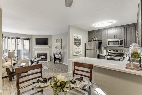 Modern dining room with elegant lighting at Santee Villas Apartments, offering stylish luxury living spaces for residents