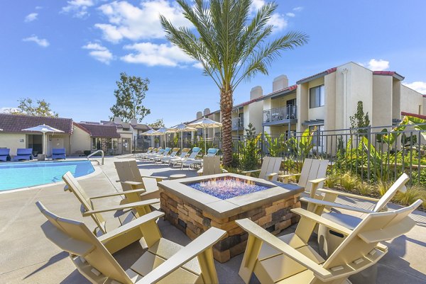 Cozy fire pit and patio area at Santee Villas Apartments, ideal for outdoor relaxation in luxury Greystar setting