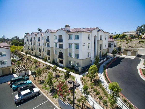 Seta Apartments: Elegant facade of luxury apartments in vibrant city neighborhood