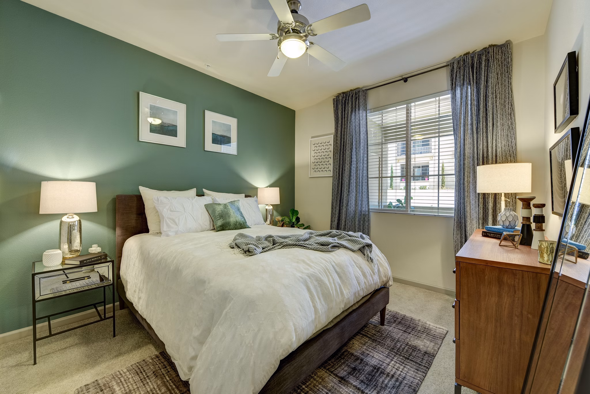 Seta Apartments: Modern bedroom with stylish decor in luxury apartment community