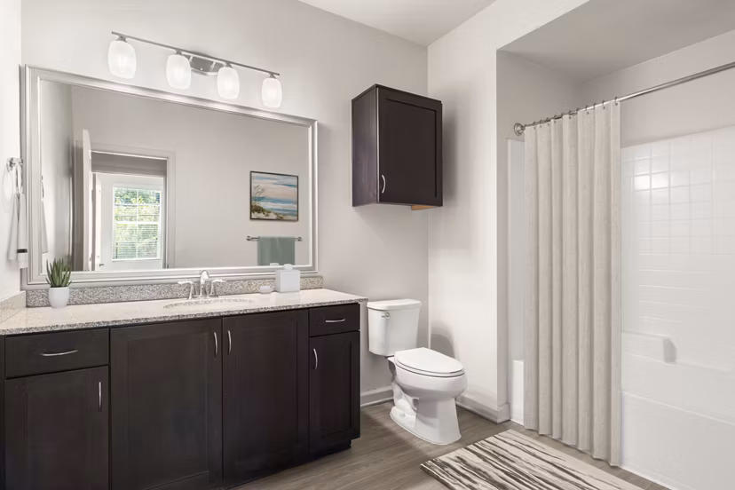 Luxury bathroom with marble countertops and modern fixtures at Seta Apartments, a Greystar luxury property in a prime location