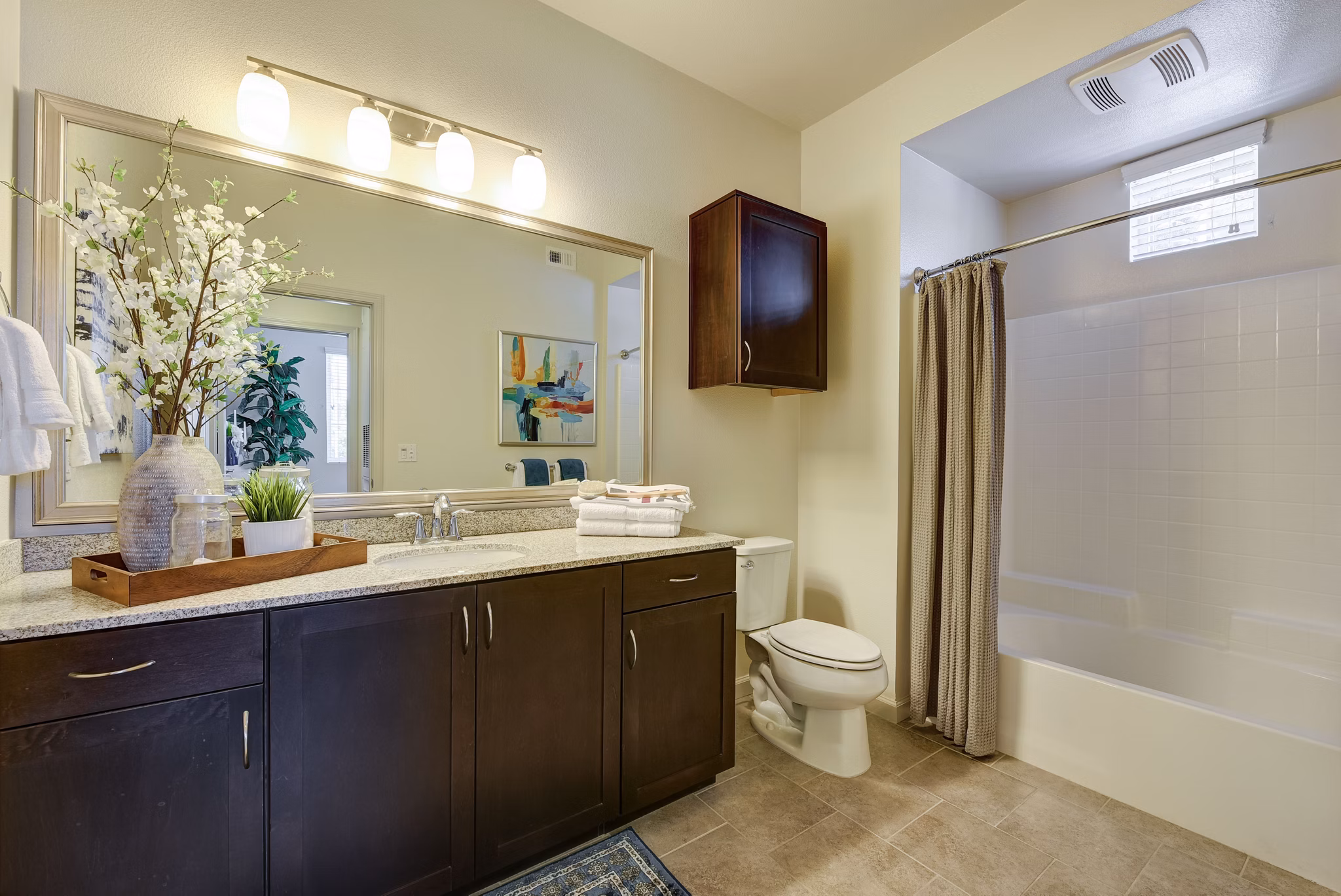 Luxury bathroom with marble countertops and modern fixtures at Seta Apartments, a Greystar luxury property in a prime location