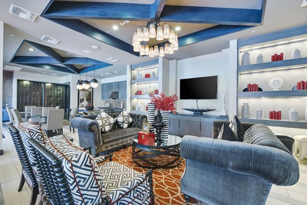 Seta Apartments: Modern clubhouse with sleek design and comfortable seating in upscale community