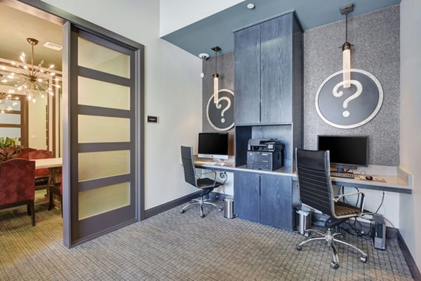 Business center with modern workstations at Seta Apartments, offering luxury amenities and professional spaces for residents