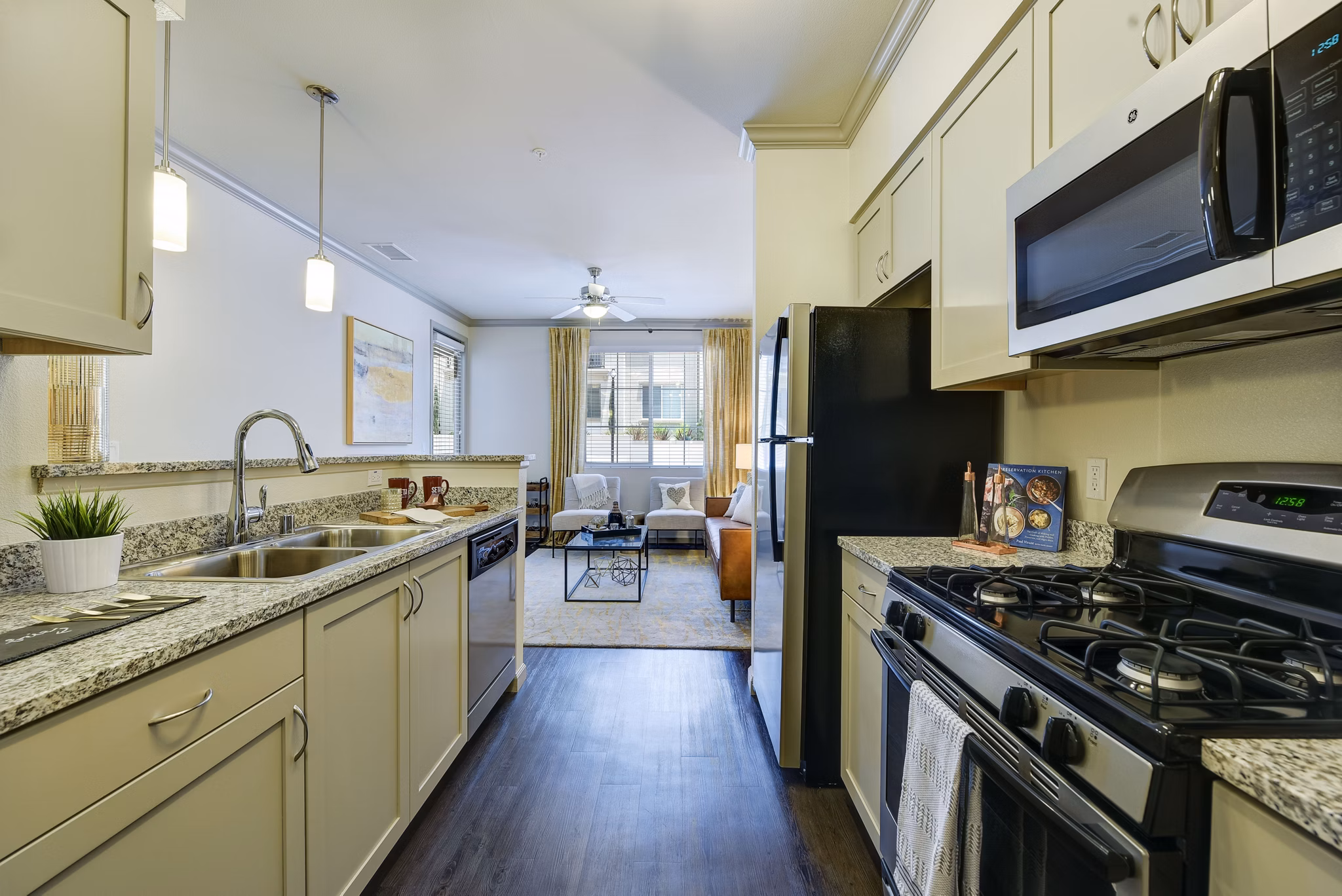 Modern kitchen with stainless steel appliances at Seta Apartments, offering a luxurious living experience