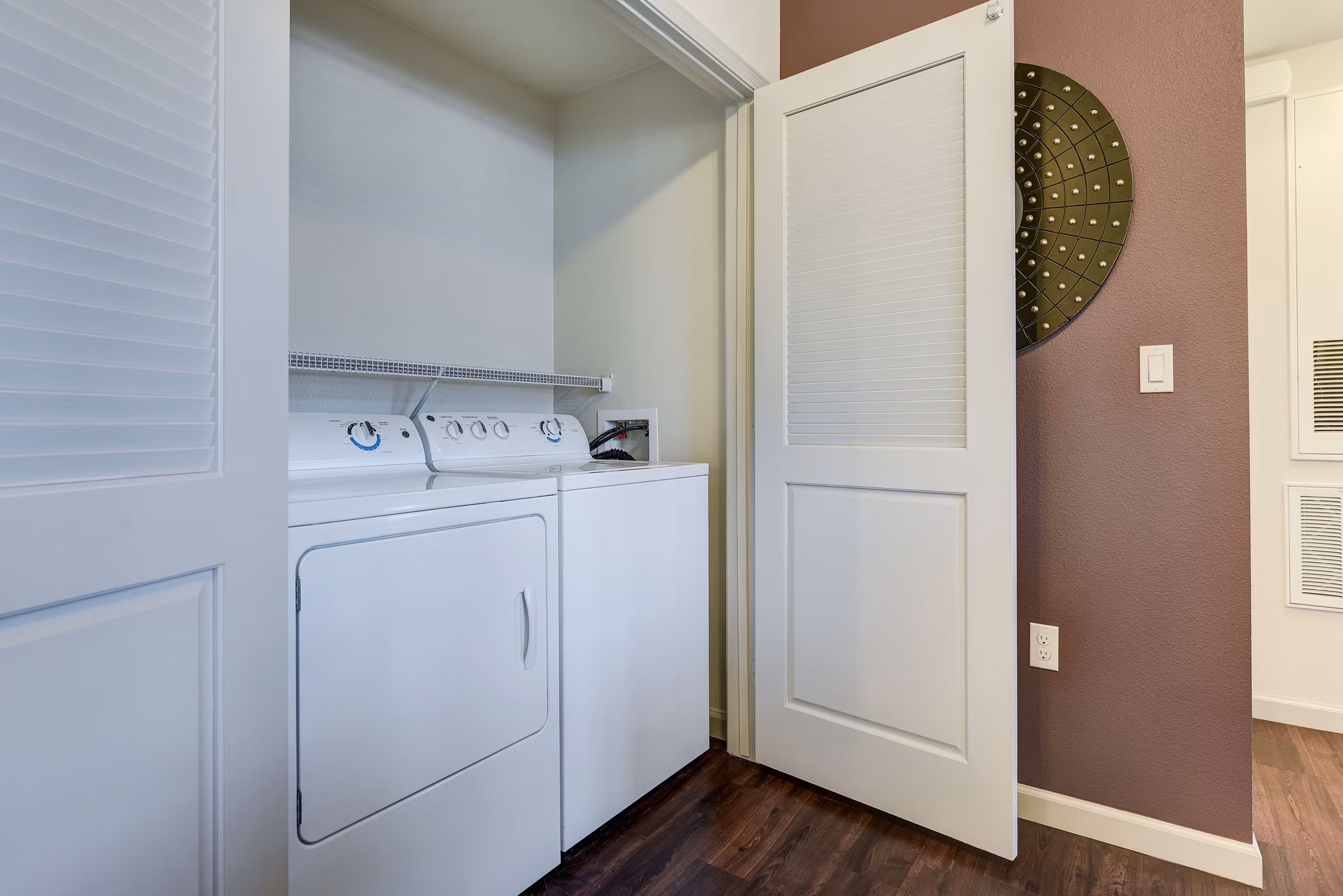 Laundry room with modern appliances at Seta Apartments, Greystar luxury apartments