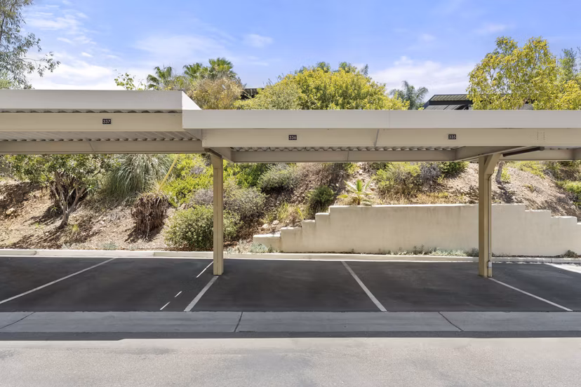 Outdoor grill area at Seta Apartments featuring modern BBQ stations and seating