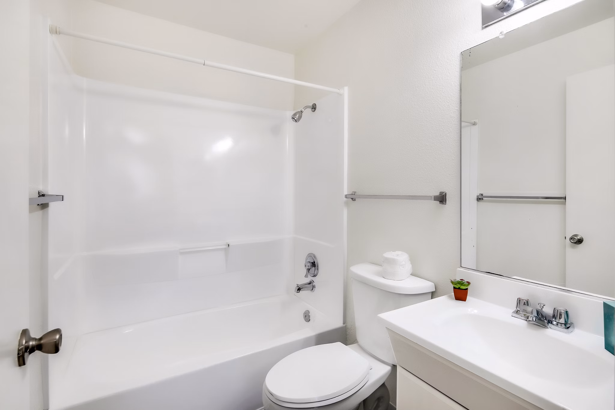 Elegant bathroom with modern fixtures at Softwind Point Apartments, offering luxury living in scenic surroundings