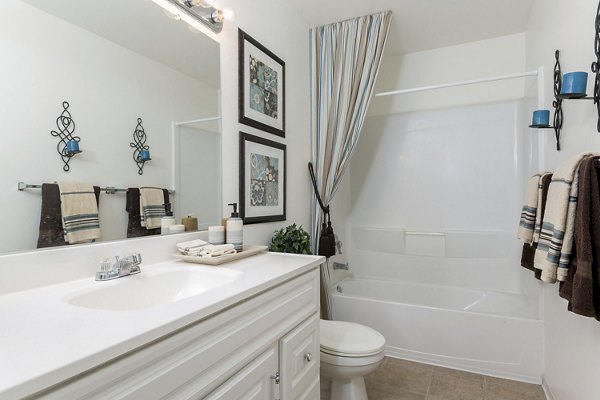 Modern bathroom with marble countertops and stylish fixtures in Softwind Point Apartments