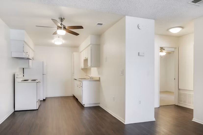 Modern kitchen with stainless steel appliances at Softwind Point Apartments, luxury living in a Greystar community