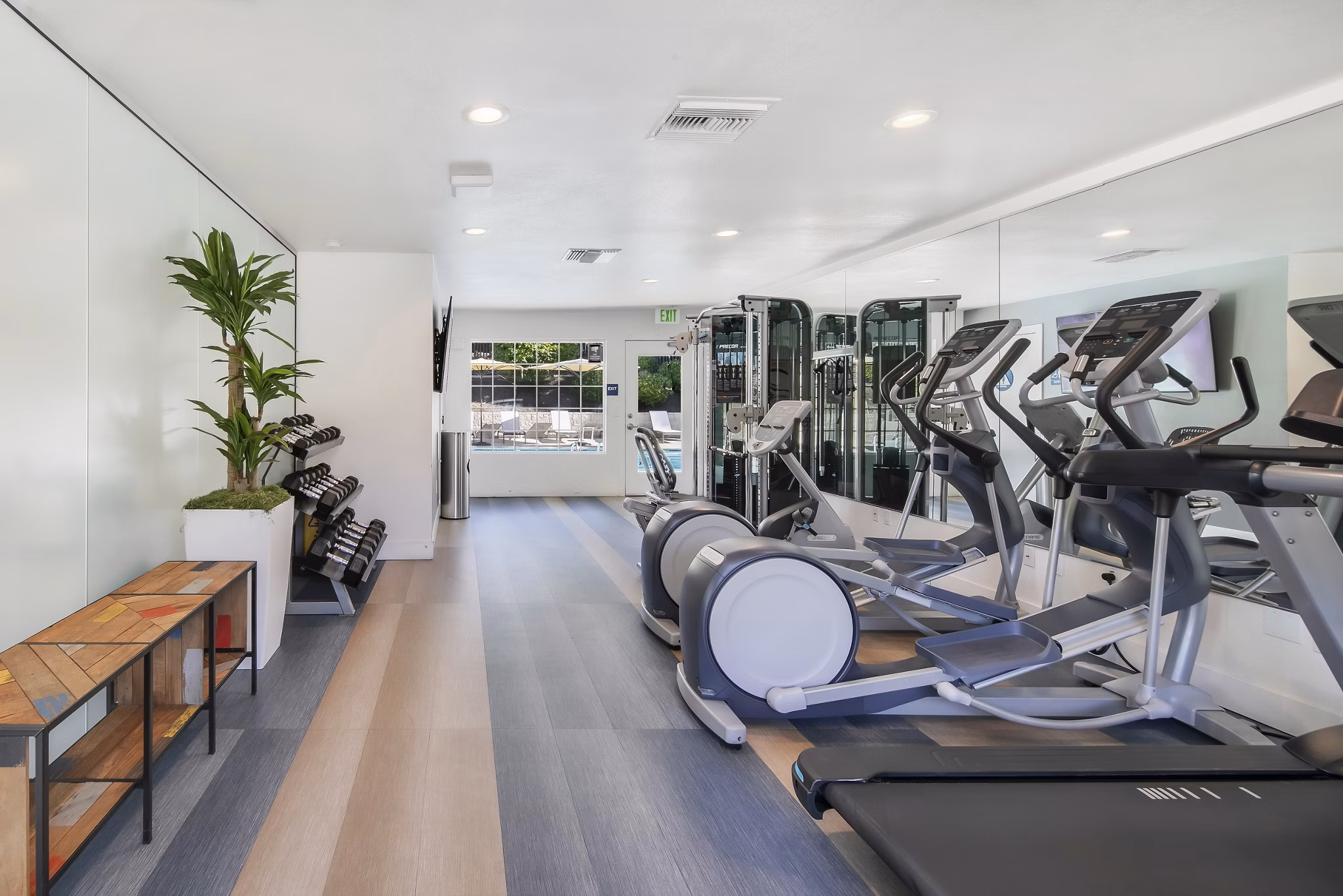 Fitness center with modern equipment at Softwind Point Apartments for active lifestyle enthusiasts