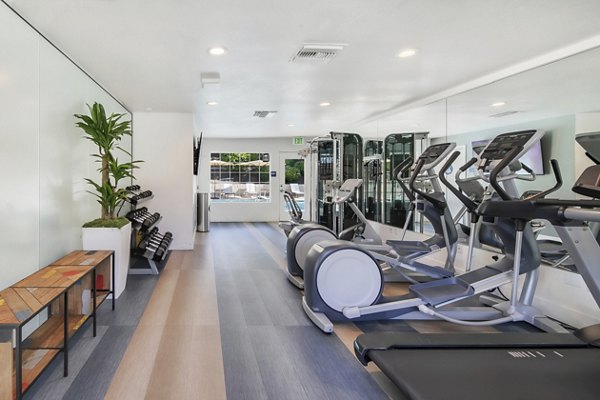 Fitness center with modern equipment at Softwind Point Apartments for active lifestyle enthusiasts