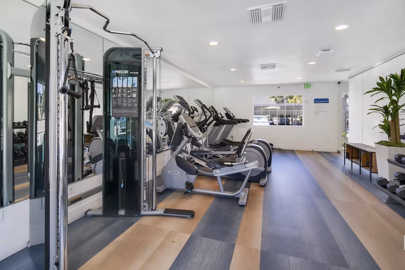 Fitness center with modern equipment at Softwind Point Apartments