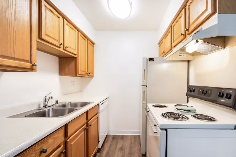 Modern kitchen with stainless steel appliances at Softwind Point Apartments