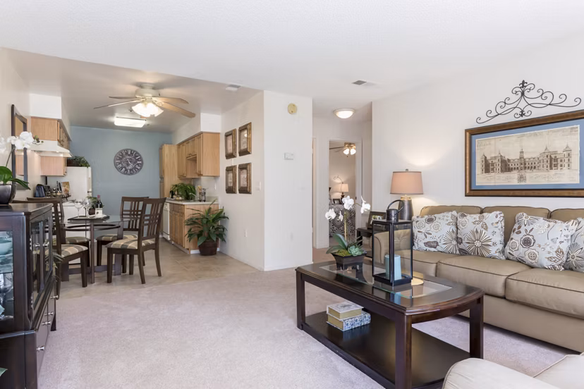 Spacious living room with modern decor and natural lighting at Softwind Point Apartments
