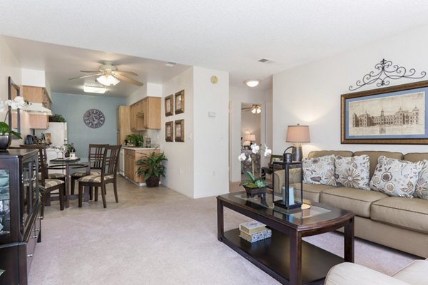 Spacious living room with modern decor and natural lighting at Softwind Point Apartments