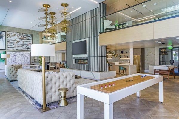 Clubhouse game room featuring pool table and seating at Sola at Pacific Highlands Ranch luxury apartments