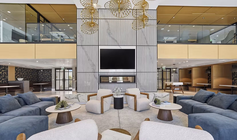Sola at Pacific Highlands Ranch: Clubhouse game room featuring modern seating and gaming tables at luxury apartments