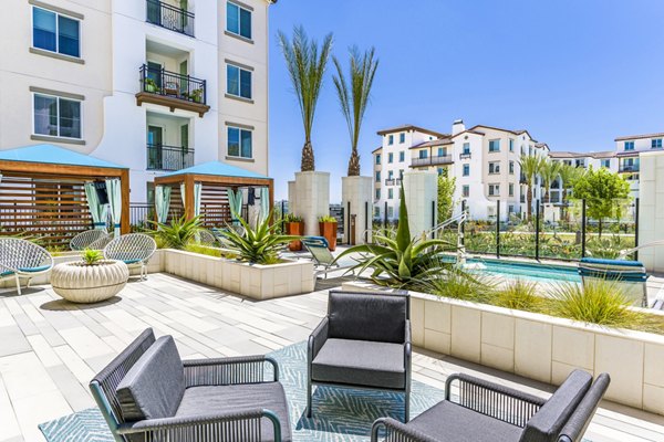 Outdoor hot tub on spacious patio at Sola at Pacific Highlands Ranch Apartments for relaxation and leisure